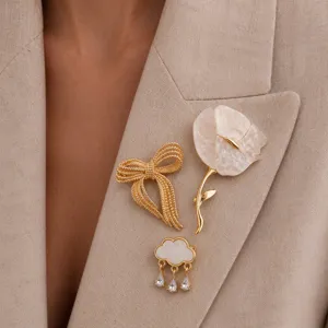 Close-up detail shot of exquisite multi-style fashion brooch set featuring bow flower and cloud.