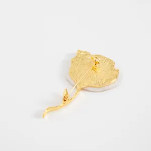 Exquisite gold flower brooch detail back view showing alloy pin fastener elegant jewelry