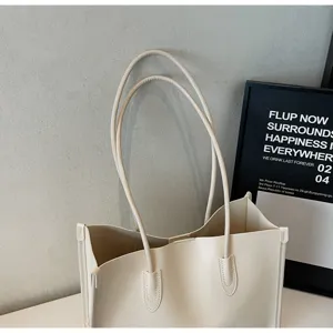 Minimalist off-white leather tote bag, soft large capacity shoulder bag for daily commuting stylish.