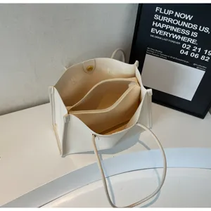 Minimalist solid color soft leather large capacity shoulder tote bag with inner pouch detail view.