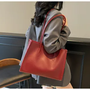 Soft leather large capacity shoulder tote bag detail view, solid color minimalist design.
