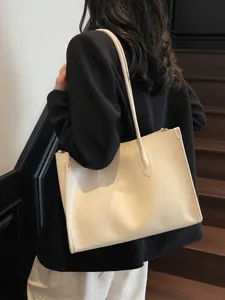 Solid color soft leather large capacity tote bag, stylish minimalist shoulder bag for women.