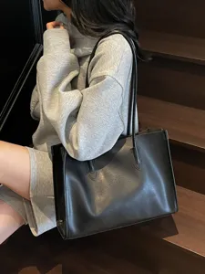 Black soft leather tote bag, large capacity shoulder underarm bag for women daily commute style.