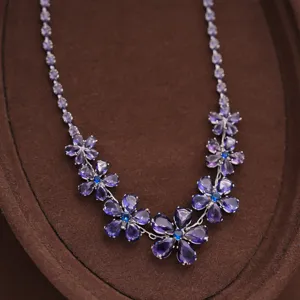 Purple crystal flower necklace detail showcasing exquisite pear-cut purple petals and dainty chain.