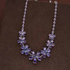 Exquisite vintage purple crystal flower necklace, sparkling rhinestone details for banquet.