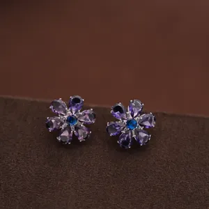 Exquisite purple gemstone floral stud earrings detail, elegant court style sparkling jewelry.