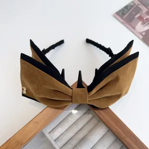 Serre-tête rétro en velours marron grand nœud avec bordure noire et charm pour femmes.