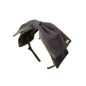 Serre-tête grand nœud en velours rétro pour femme, élégant accessoire de coiffure.