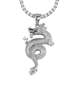 Detailed view of a hip hop style silver dragon pendant necklace with sparkling stones.