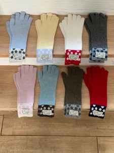 Gants longs en tricot avec poignets à pois, accessoires d'hiver chauds et élégants pour femmes.