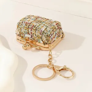 Bunte Tweed Mini Münztasche mit goldenem Kussverschluss und Schlüsselanhänger für Damen.