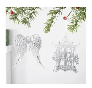 Acrylic Christmas tree hanging ornaments featuring angel wings and carousel designs.