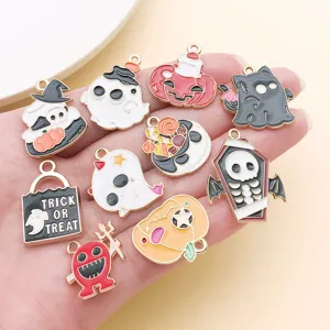 Close-up of cute Halloween enamel charms, featuring ghosts, pumpkins, and skulls for DIY jewelry.