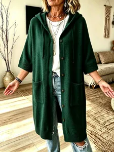 Cardigan en tricot à capuche unicolore pour femme manches longues boutonnées automne.