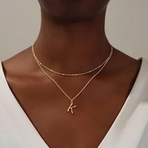 Gouden dubbele ketting met letter K, minimalistische Franse retro choker voor dagelijks gebruik.