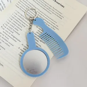 Ensemble porte-clés miroir et peigne bleu portable, élégant accessoire de sac chic.
