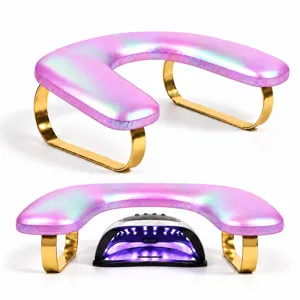 U-shaped nail hand rest with pink PU leather and gold legs for professional manicure salon use.