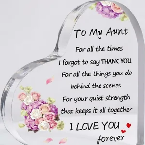 Detail de plaque en acrylique transparente avec message pour tante et motif floral.