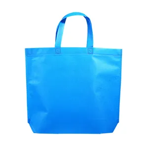 Bolsa de compras de tela no tejida azul brillante con asas resistentes ecologica reutilizable.