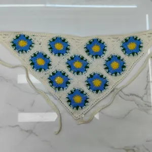 Crochet floral triangle bandana detail, handmade look knit hair scarf and fashion accessory.