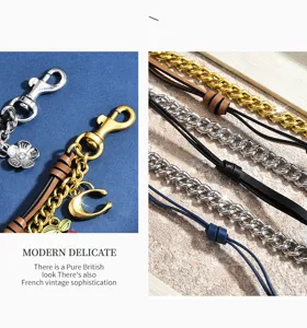 Detailed view of stylish cherry bag charm and metal chains, showing premium hardware finish.