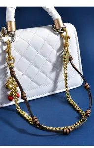 Stylish white quilted bag chain with gold metal leather strap and cute cherry charm.