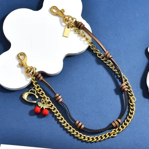 Stylish metal and leather handbag chain with cute cherry and C charms for trendy DIY bag decoration.
