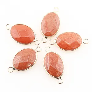Détail de pendentif en cristal ovale en pierre naturelle avec bordure dorée pour bijoux DIY.