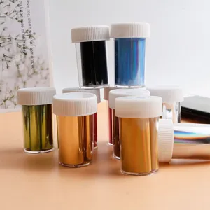 Bottled starry nail art transfer paper set, colorful DIY foil stickers for manicure designs.