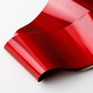 Red metallic nail transfer foil starry paper for DIY nail art decoration and stylish manicure look.