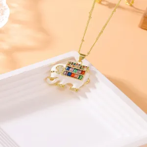 Exquisite copper elephant pendant necklace with colorful cubic zirconia and white enamel details.