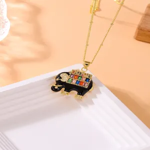 Chic copper elephant pendant necklace with colorful cubic zirconia and elegant design.