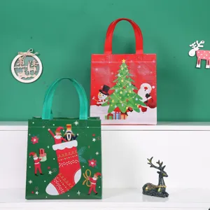Christmas gift bags non-woven waterproof cute holiday tote bags for kids candy and party favors view