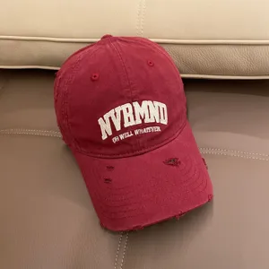 Vintage distressed red baseball cap for women, casual soft top dad hat with embroidered text.