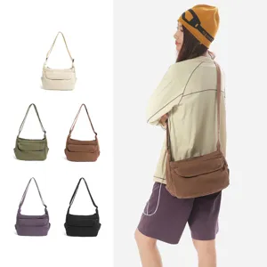 Retro canvas crossbody bag for women, casual minimalist Japanese style shoulder bag with multi-color options.