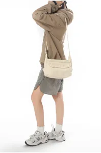 Casual retro canvas crossbody bag in solid off-white, minimalist Japanese style detail.