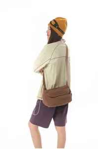 Retro canvas messenger bag for women, simple solid color crossbody shoulder bag daily use.