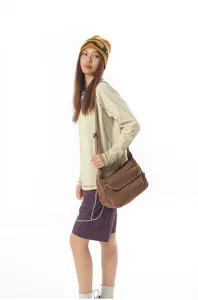 Vintage canvas messenger bag for women and men, casual shoulder crossbody bag for daily use.