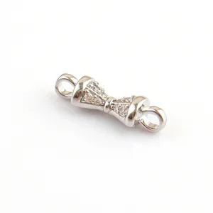 Detailed view of silver tone rhinestone metal connector finding for DIY jewelry making.