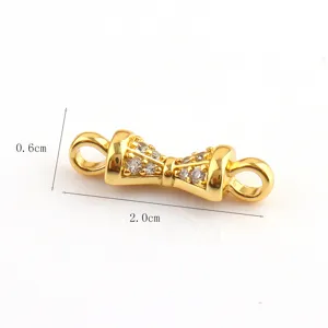 Close-up detail view of the gold plated jewelry connector with sparkly zirconia stones.