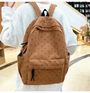 Sac à dos en velours côtelé avec motif étoiles, grand cartable pour étudiants et voyage.