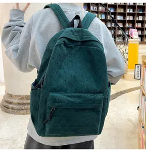 Sac à dos en velours côtelé vert foncé, vue détaillée pour les étudiants et loisirs.