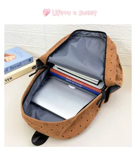 Grand sac à dos d'étudiant en velours côtelé avec compartiment pour ordinateur et étoiles.