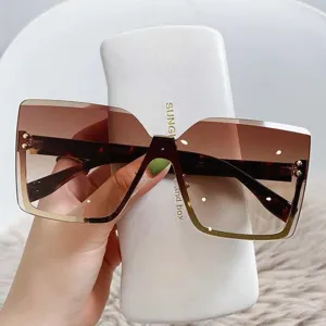 Grandes lunettes de soleil sans monture dégradées pour femmes, protection UV style de rue.