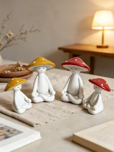 Cute meditating mushroom figurines, zen resin statues for cozy home decor and desk display.