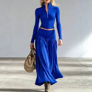 Royal blue long sleeve zip top with an elegant high waist maxi skirt two-piece set.
