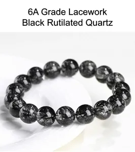 Detailed close-up view of natural black rutilated quartz crystal gemstone bead bracelet.