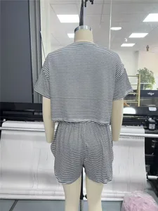 Back detail view of black and white striped knit pajama shorts set for comfortable lounging.