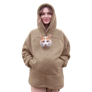 Fleece cat pouch hoodie detail featuring soft warm sherpa fabric and convenient pet pocket.