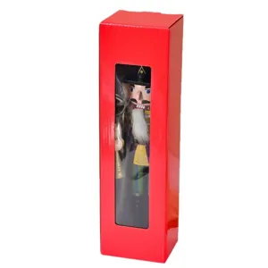 Poupée soldat casse-noisette en bois de 30 cm dans une boîte cadeau rouge de Noël.